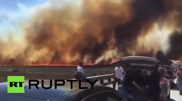 California Inferno: Huge fire sweeps over freeway, people run for their lives