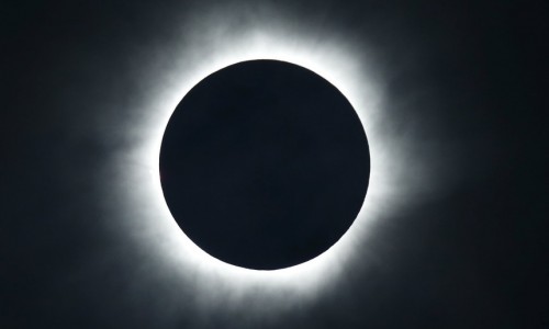 A solar eclipse is seen from the beach of Ternate island, Indonesia, March 9, 2016. REUTERS/Beawiharta