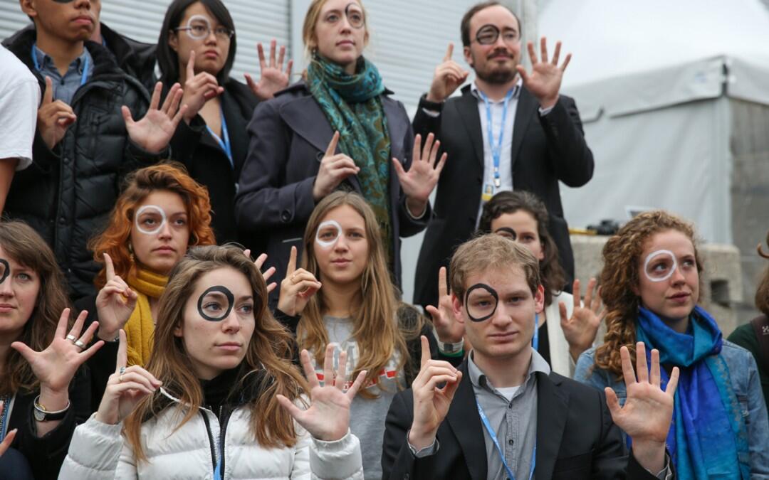 Members of civil society demonstrate in support of the Climate Vulnerable Forum