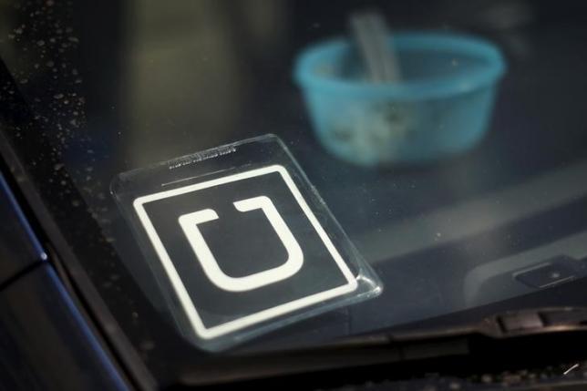 Uber seeking to buy self-driving cars