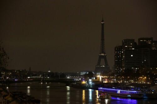 A picture shows the Eiffel Tower in Paris after it went dark for the Earth Hour environmental campaign on March 19, 2016. / AFP / LUDOVIC MARIN (Photo credit should read LUDOVIC MARIN/AFP/Getty Images)