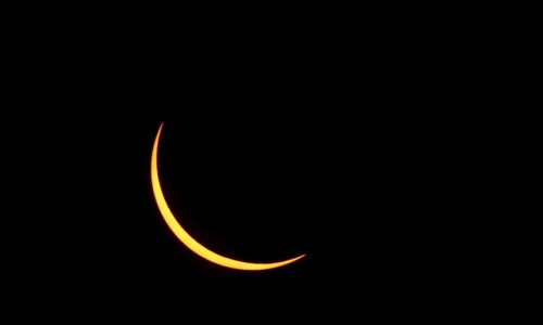 A solar eclipse is seen from the beach of Ternate island, Indonesia, March 9, 2016. REUTERS/Beawiharta