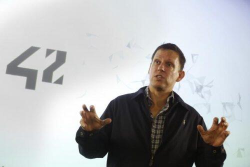 Peter Thiel, the Silicon Valley investor who co-founded PayPal, talks to students during his  visit to the 42 school campus in Paris, France, February 24, 2016.   REUTERS/Jacky Naegelen/File Photo