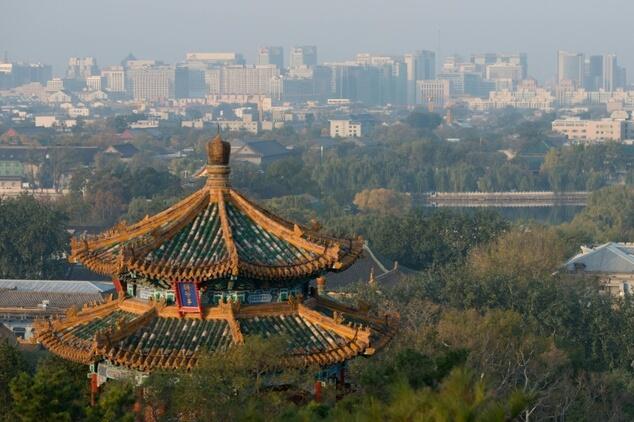 China probes school playing fields after children fall ill