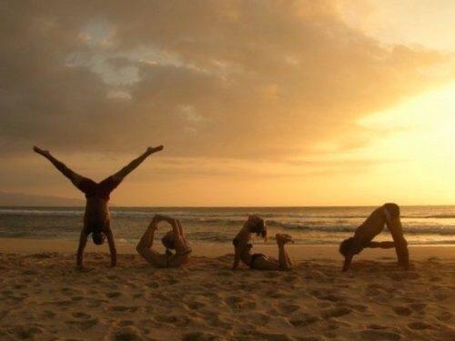 beach,people,poses,sand,sunlight,yoga-4cee7b819fec04c3934dd9a386a84237_h