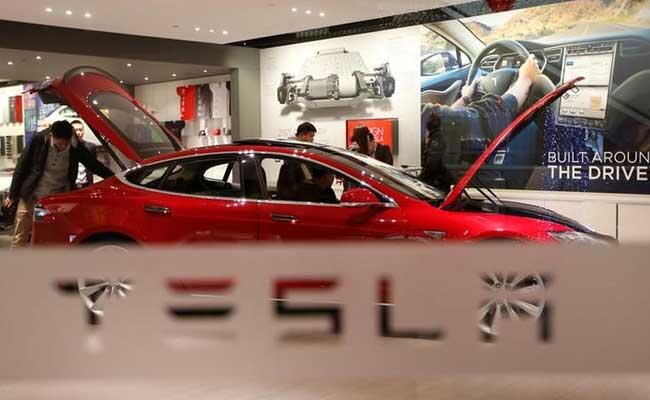 Tesla surprises with profit in third quarter