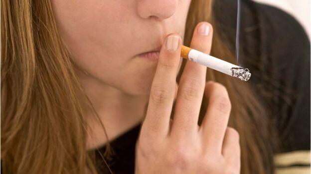 Cigarettes sold in plain green packs under new rules