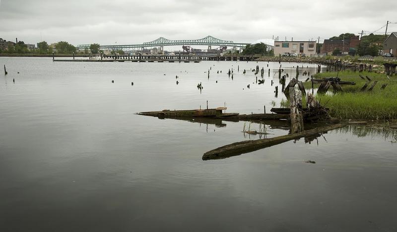 Comment la ville de Massachusetts a-t-elle assumé des charges environnementales pour la région